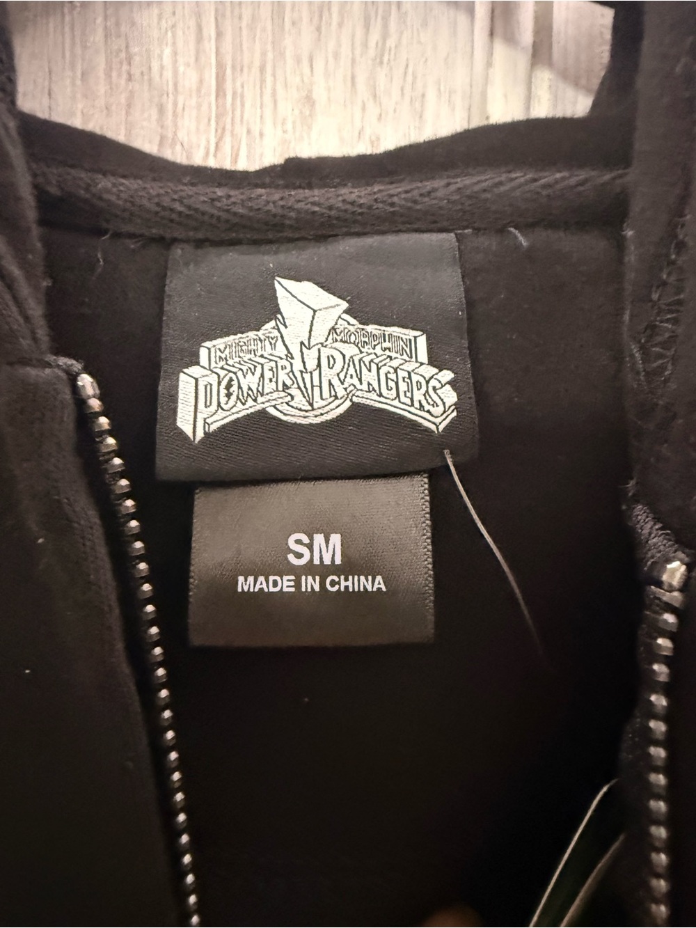 Power Ranger Black Zip-Up Hoodie with Multicolor Ranger Emblems - Picture 4 of 6